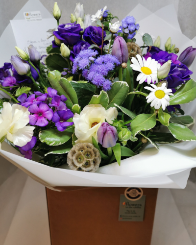 Cool Breeze - This classical stylish collection of flowers, make this hand tied the perfect gift. Flowers professionally arranged and delivered by a local florist.